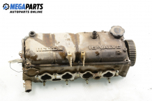 Головка блока цилиндров for Mazda 323 (BA) 1.3 16V, 73 hp, седан, 5 вр., 1995