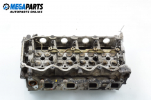 Cylinder head no camshaft included for Nissan Almera (N16) 2.2 Di, 110 hp, hatchback, 2001