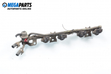 Fuel rail with injectors for Nissan Almera (N15) 1.4, 87 hp, hatchback, 1997 Fuel rail with injectors for Nissan Almera (N15) 1.4, 87 hp, hatchback, 1997