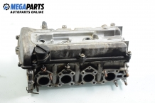 Cylinder head no camshaft included for Suzuki Liana 1.3, 90 hp, hatchback, 2003