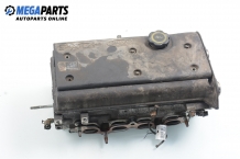 Головка блока цилиндров for Ford Fiesta IV 1.25 16V, 75 hp, 5 вр. automatic, 1996