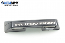 External boot lid handle for Mitsubishi Pajero Pinin 1.8 GDI, 120 hp, 3 doors automatic, 2000 External boot lid handle for Mitsubishi Pajero Pinin 1.8 GDI, 120 hp, 3 doors automatic, 2000