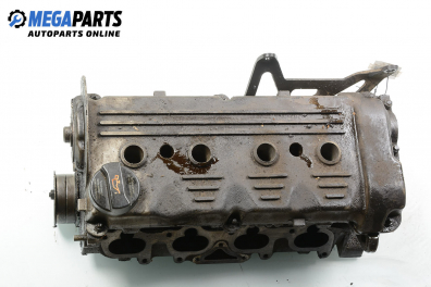 Engine head for Audi A6 (C4) 2.0 16V, 140 hp, station wagon, 5 doors, 1995