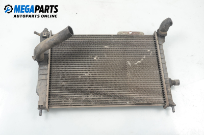 Water radiator for Opel Astra F 1.8, 90 hp, station wagon, 5 doors, 1993