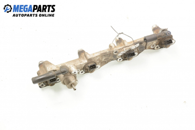 Fuel rail with injectors for Ford Escort 1.6 16V, 90 hp, hatchback, 5 doors, 1994