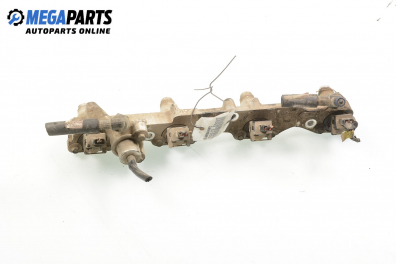 Fuel rail with injectors for Ford Escort 1.6 16V, 90 hp, hatchback, 3 doors, 1994