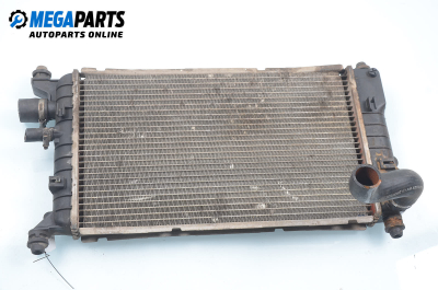 Water radiator for Ford Escort 1.4, 71 hp, station wagon, 5 doors, 1992