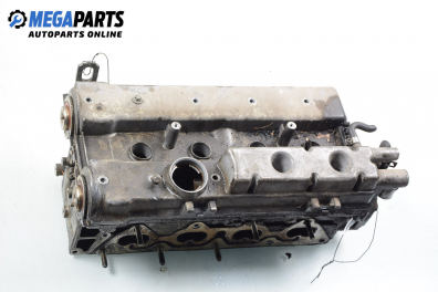 Engine head for Opel Tigra 1.6 16V, 106 hp, coupe, 3 doors, 1996