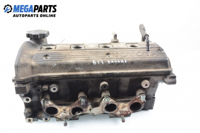 Cylinder head no camshaft included for Toyota Corolla (E110) 1.4, 86 hp, hatchback, 1999