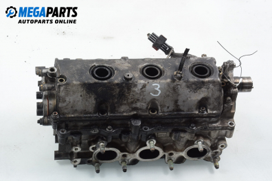 Engine head for Opel Vectra C 3.0 V6 CDTI, 177 hp, station wagon automatic, 2004
