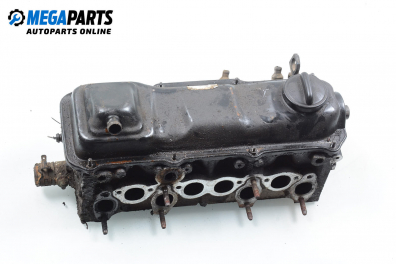 Engine head for Volkswagen Passat (B2) 1.6, 75 hp, station wagon, 1986