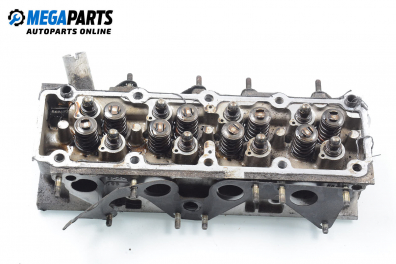 Cylinder head no camshaft included for Opel Frontera A 2.0, 115 hp, suv, 1995