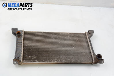 Water radiator for Ford Transit 2.5 D, 71 hp, truck, 1990