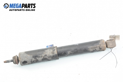 Shock absorber for Nissan Terrano II (R20) 2.7 TDi, 125 hp, 5 doors automatic, 1998, position: front
