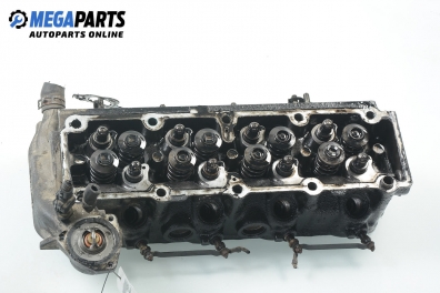 Cylinder head no camshaft included for Opel Astra G 1.7 TD, 68 hp, station wagon, 1999