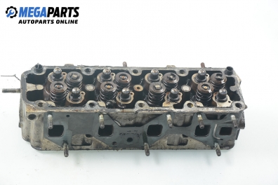 Cylinder head no camshaft included for Opel Vectra A 1.6, 75 hp, sedan, 1992