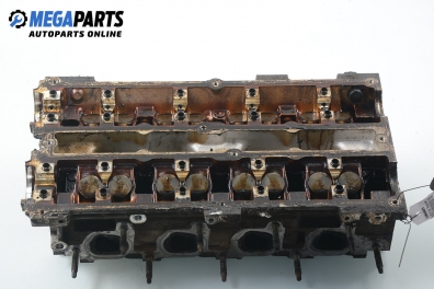 Cylinder head no camshaft included for Ford Escort 1.6 16V, 90 hp, station wagon, 1996