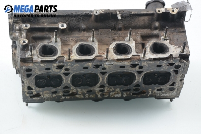 Cylinder head no camshaft included for Ford Escort 1.6 16V, 90 hp, station wagon, 1996