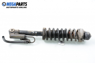 Macpherson shock absorber for BMW 5 (E34) 2.5 TDS, 143 hp, station wagon, 1995, position: rear - left