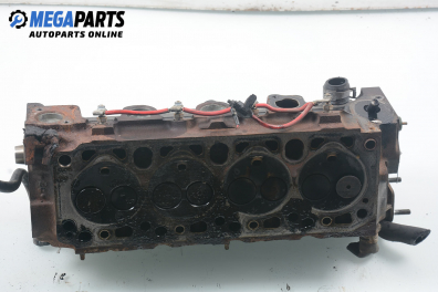 Engine head for Ford Escort 1.8 TD, 90 hp, station wagon, 2000