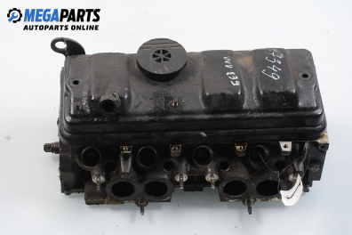 Cylinder head no camshaft included for Peugeot 306 1.6, 89 hp, station wagon, 1998
