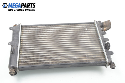 Water radiator for Ford Escort 1.4, 75 hp, station wagon, 1996