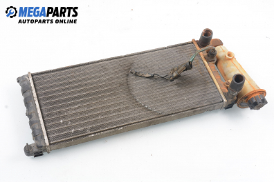 Water radiator for Lancia Y10 1.1 i.e., 50 hp, 1993
