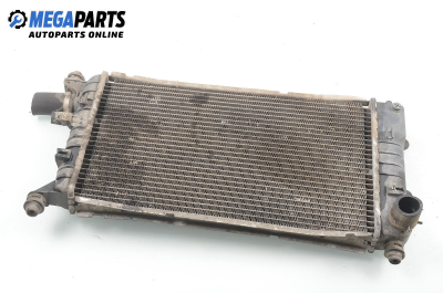 Water radiator for Ford Escort 1.6, 90 hp, sedan, 1992