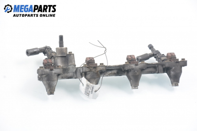 Fuel rail with injectors for Ford Mondeo Mk II 2.0, 131 hp, sedan, 1997