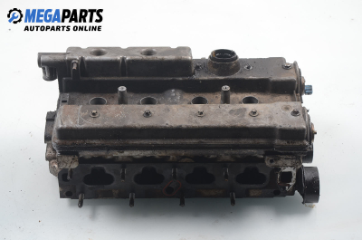 Engine head for Opel Corsa B 1.4 16V, 90 hp, 5 doors, 1995