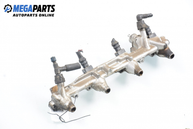 Fuel rail with injectors for Ford Mondeo Mk I 2.0 16V, 136 hp, station wagon, 1993
