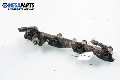 Fuel rail with injectors for Ford Escort 1.8 16V, 105 hp, station wagon, 1992