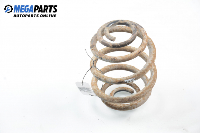 Coil spring for Ford Escort 1.6, 90 hp, station wagon, 1991, position: rear