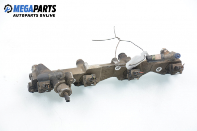 Fuel rail with injectors for Ford Escort 1.6 16V, 90 hp, station wagon, 1994