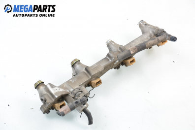 Fuel rail with injectors for Ford Mondeo Mk I 2.0 16V, 136 hp, hatchback, 1993
