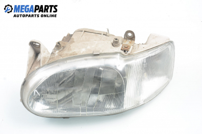 Far for Ford Escort 1.8 D, 60 hp, hatchback, 5 uși, 1996, position: stânga