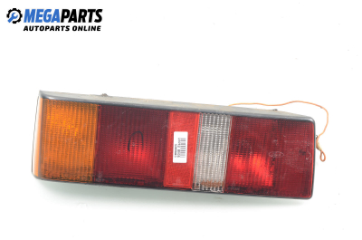 Tail light for Ford Escort 1.4, 73 hp, hatchback, 3 doors, 1989, position: left