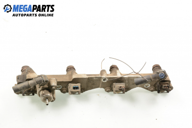 Fuel rail with injectors for Ford Escort 1.6 16V, 90 hp, hatchback, 5 doors, 1997