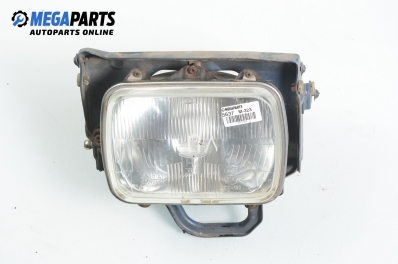 Headlight for Mazda 323 (BG) 1.6 16V, 88 hp, hatchback, 5 doors, 1992, position: left