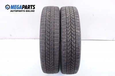 Snow tires BRIDGESTONE 145/65/15, DOT: 3109 (The price is for the set)