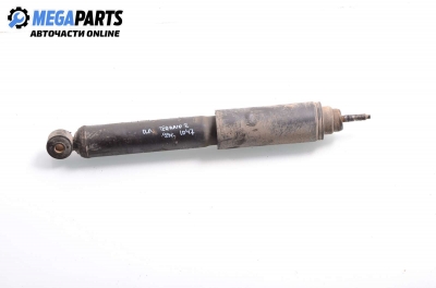 Shock absorber for Nissan Terrano II (R20) 2.7 TDI, 125 hp automatic, 1999, position: front - left