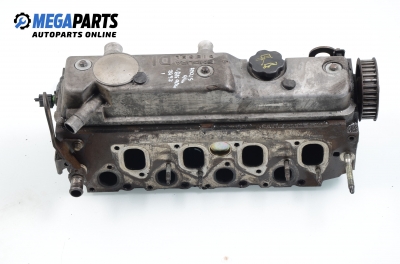 Engine head for Ford Focus 1.8 TDDi, 90 hp, hatchback, 5 doors, 1999