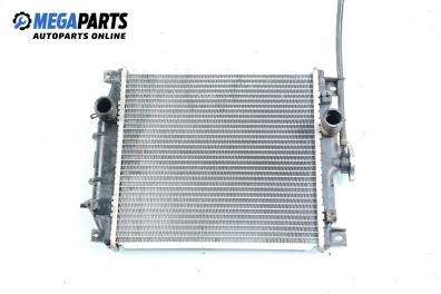 Water radiator for Suzuki Swift 1.0, 53 hp, hatchback, 3 doors, 1995
