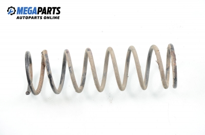 Coil spring for Mazda 121 (DB) 1.3, 53 hp, sedan, 1991, position: rear