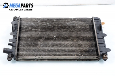 Water radiator for Ford Escort 1.8, 105 hp, station wagon, 1995
