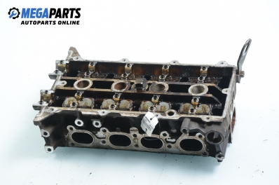 Cylinder head no camshaft included for Mazda 626 (V) 1.8, 105 hp, sedan, 1992