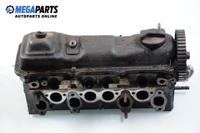 Engine head for Volkswagen Passat (B3) 1.8, 90 hp, station wagon, 1990