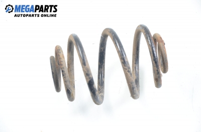 Coil spring for Ford Escort 1.8 TD, 90 hp, station wagon, 2000, position: rear