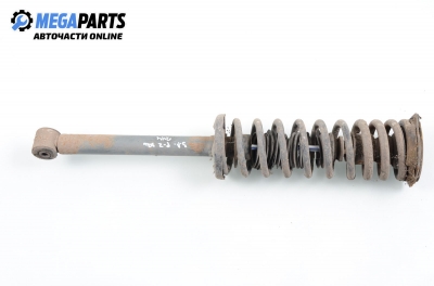 Macpherson shock absorber for Volkswagen Passat 1.8, 90 hp, station wagon, 1989, position: rear - left