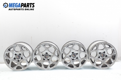 Alloy wheels for Saab 900 (1993-1998) 15 inches, width 7 (The price is for the set)